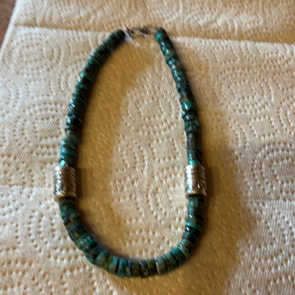 It is a 20 inch turquoise heshi sterling, silver necklace handmade brand new